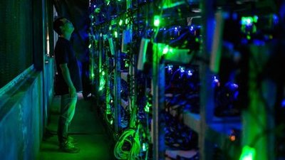 Modern Bitcoin mining farm with rows of high-tech mining rigs